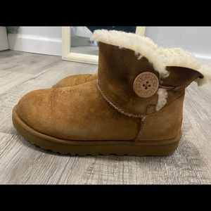 Brown Ugg boot with button